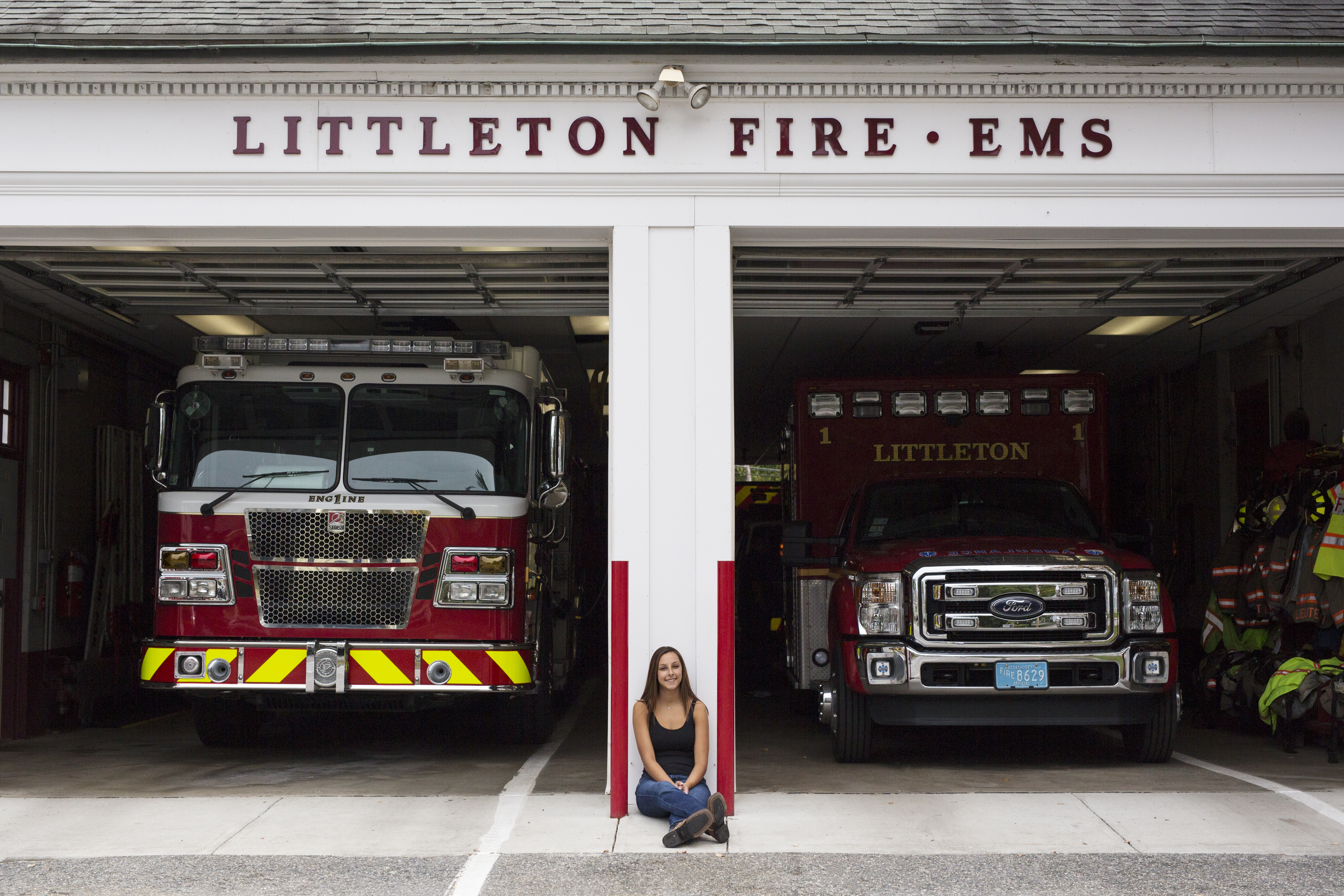 fire station senior girl portrait session with trucks