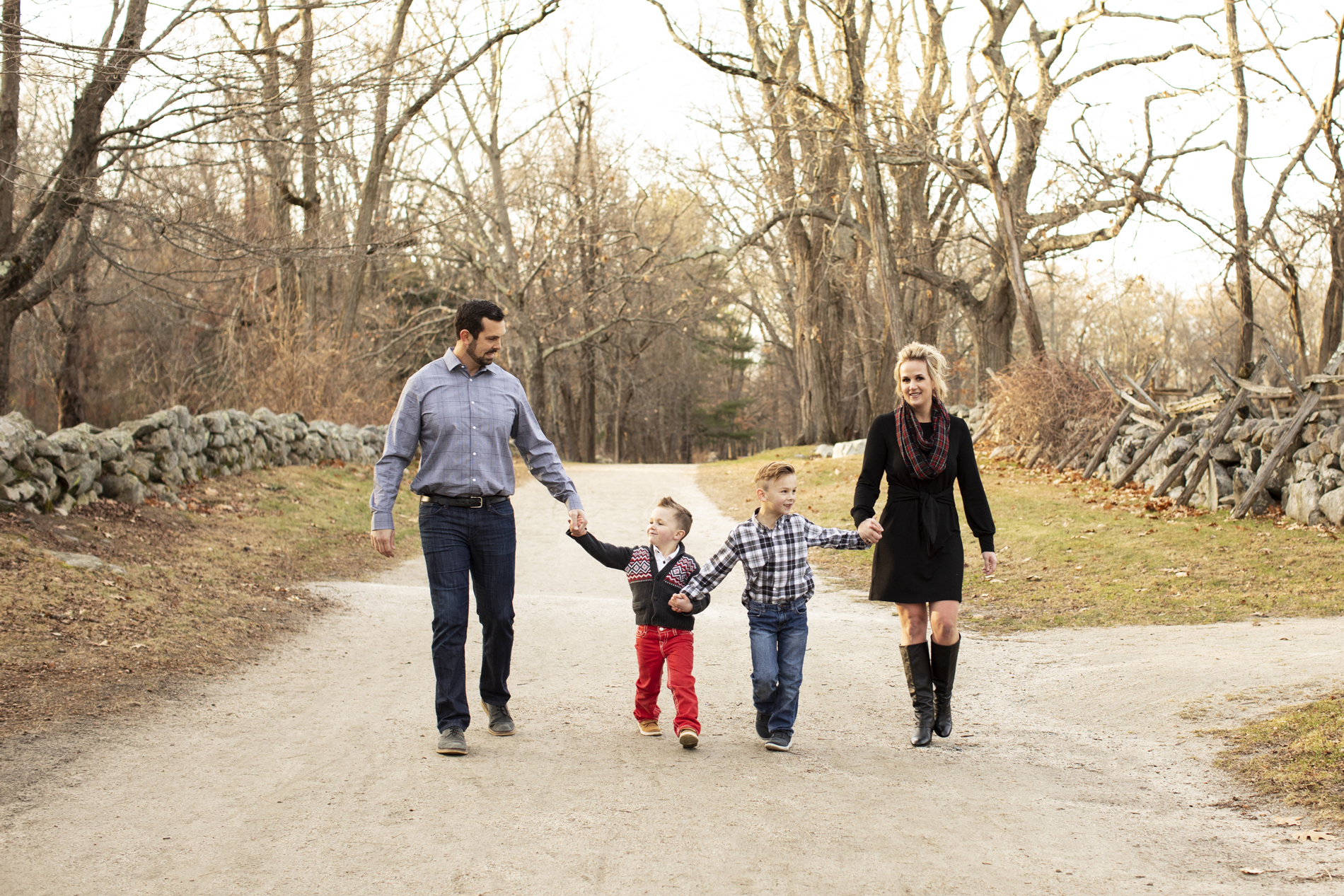 family walking mom dad two boys concord lincoln lexington massachusetts battle road